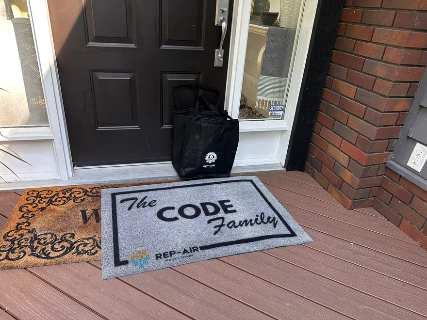 A Fraser Valley homeowner with their personalised Rep-Air welcome gift, photo 8