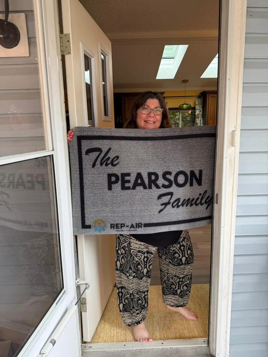 A Fraser Valley homeowner with their personalised Rep-Air welcome gift, photo 16
