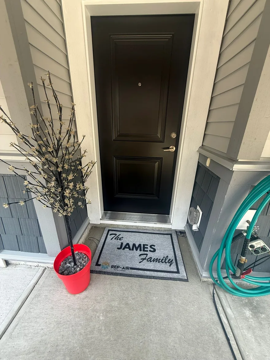 A Fraser Valley homeowner with their personalised Rep-Air welcome gift, photo 26