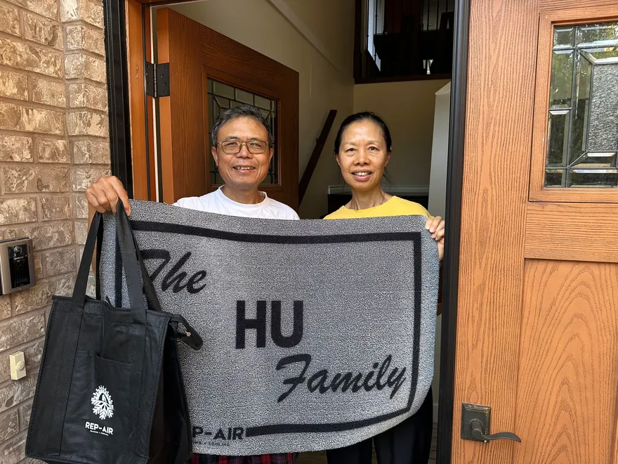 A Fraser Valley homeowner with their personalised Rep-Air welcome gift, photo 3