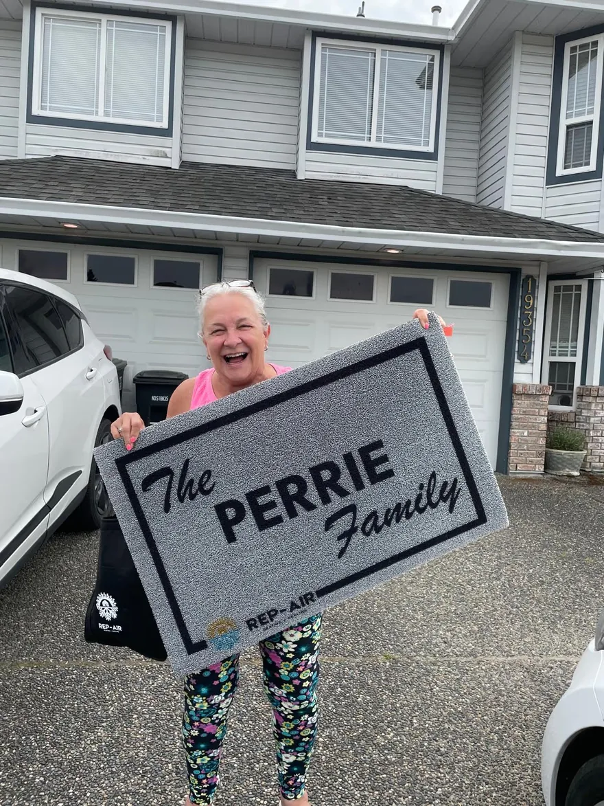 A Fraser Valley homeowner with their personalised Rep-Air welcome gift, photo 5