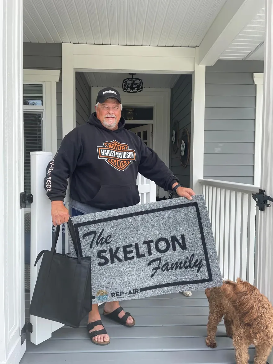A Fraser Valley homeowner with their personalised Rep-Air welcome gift, photo 6