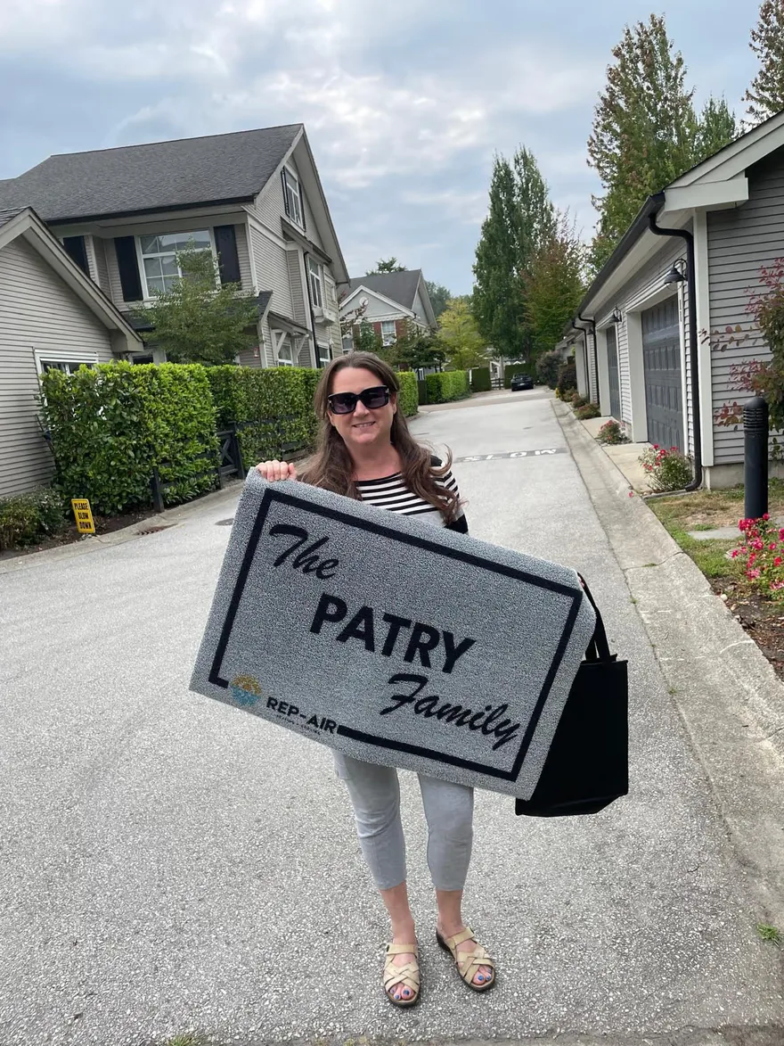 A Fraser Valley homeowner with their personalised Rep-Air welcome gift, photo 7