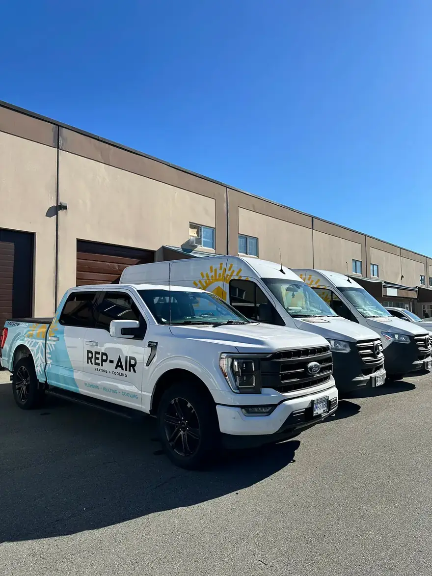 Rep-Air branded service trucks outside the Mission, BC shop