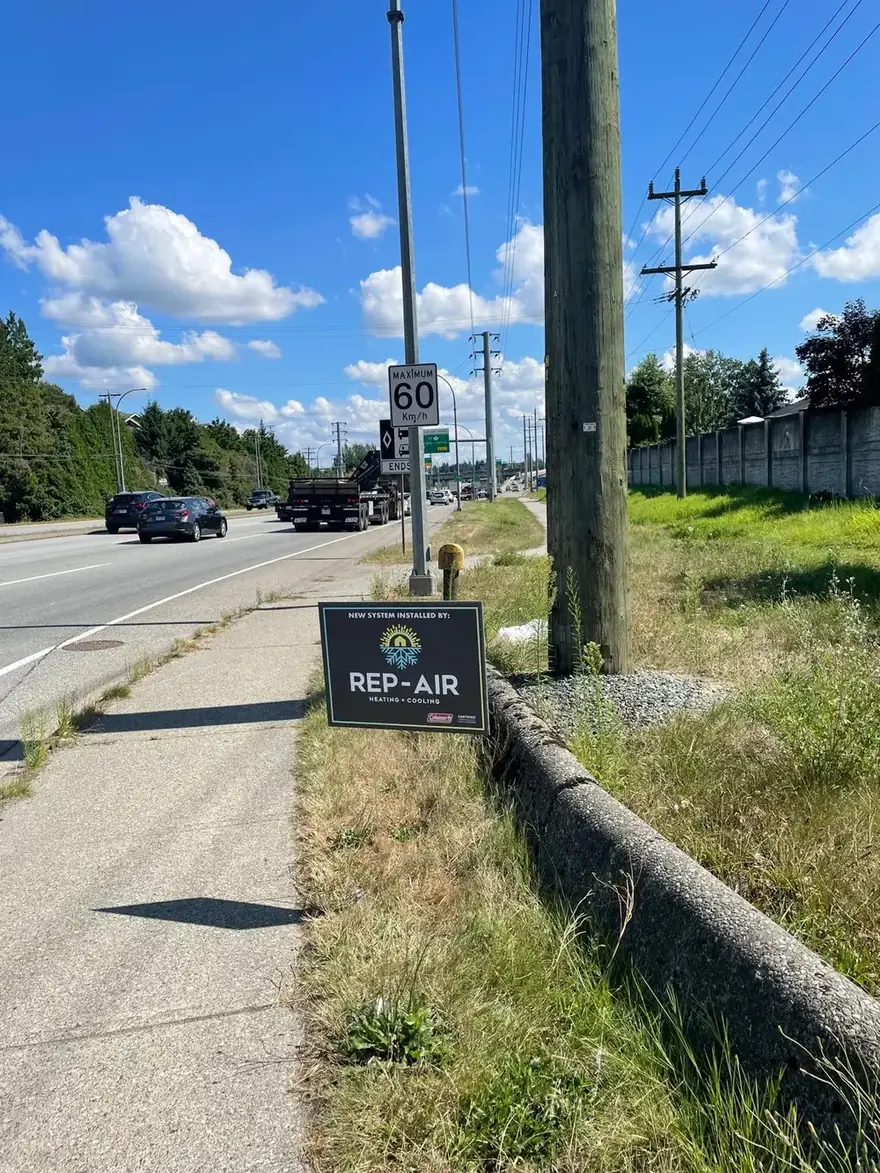 Rep-Air yard sign beside a road