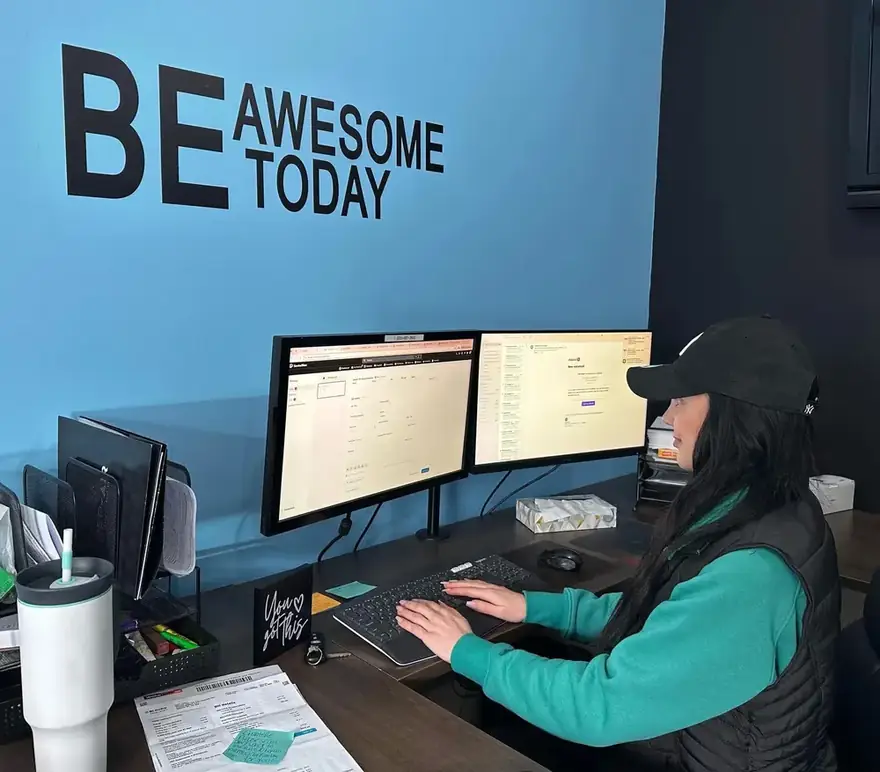 Rep-Air office staff member working at a desk