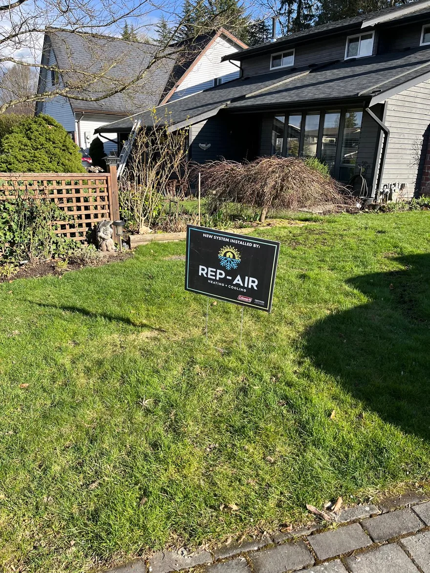 Rep-Air yard sign on a front lawn