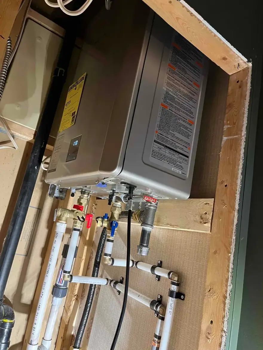 Tankless water heater with new piping in an open wall