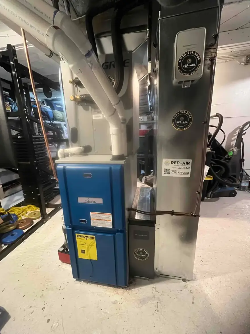 Gas furnace with new venting and ductwork in a garage