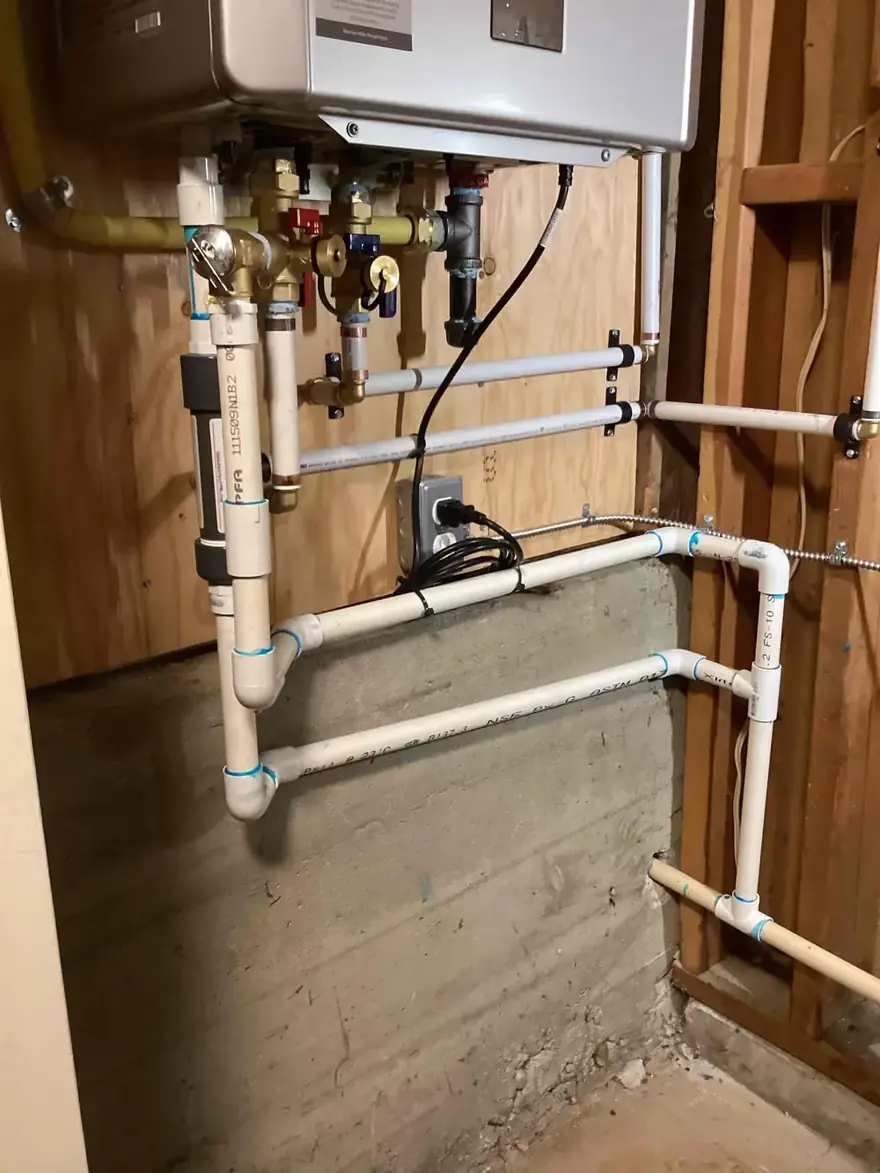 Tankless water heater with new gas and water piping