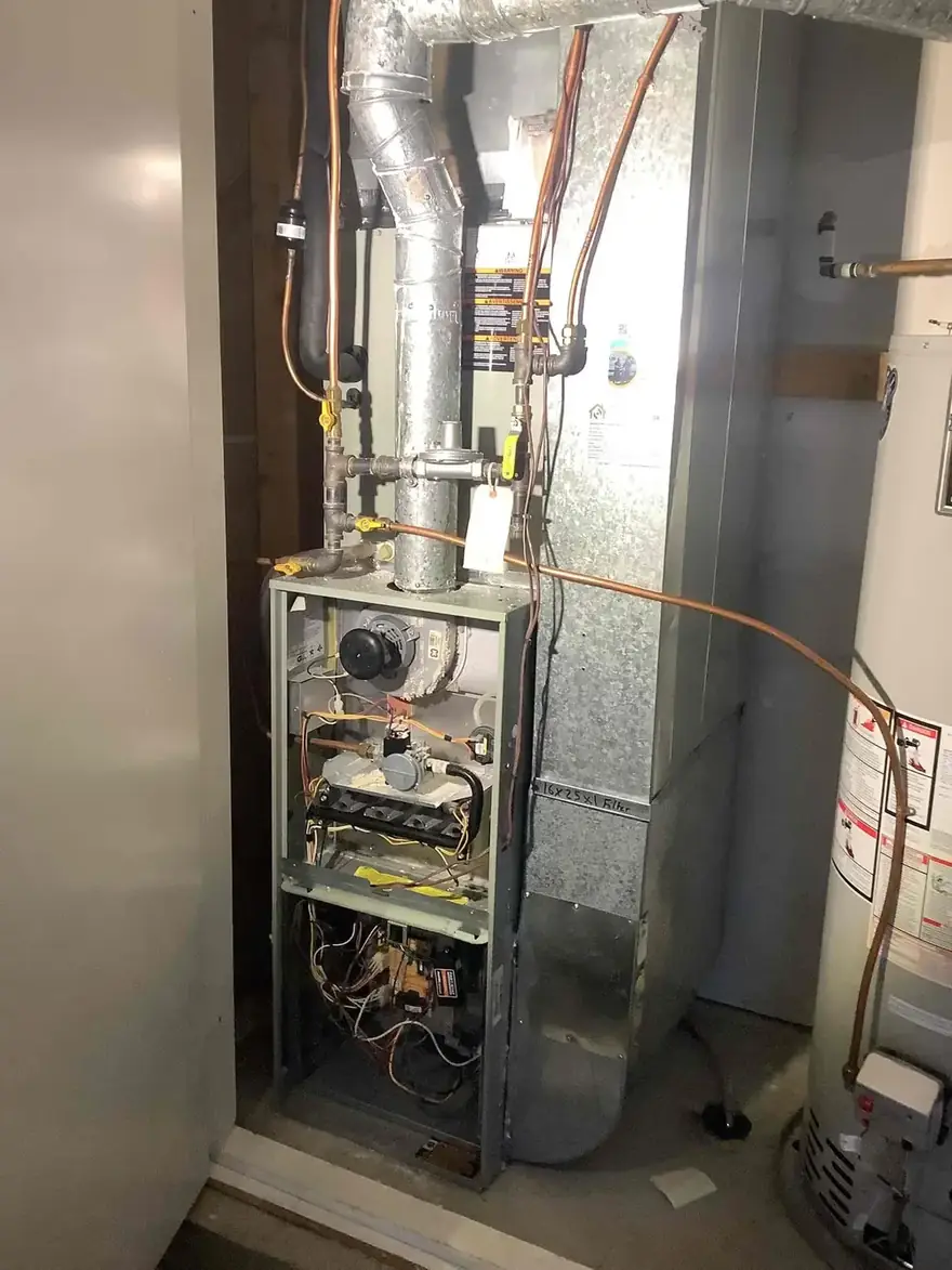 Gas furnace with the front panel off for service